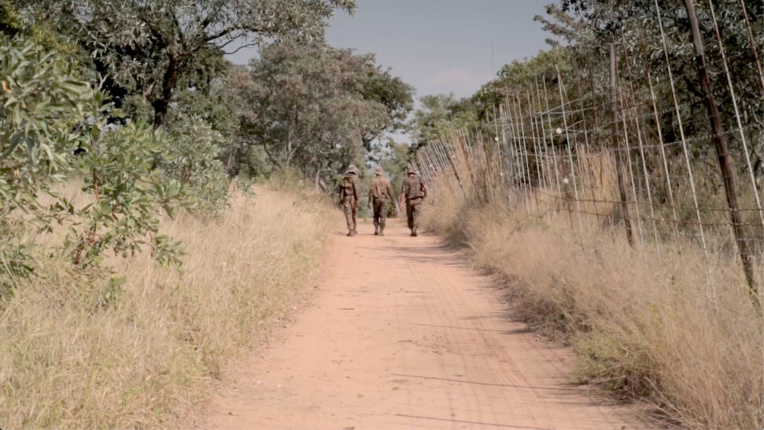 This photo shows anti-poaching rangers patrolling a game reserve fence. An image from the Rhino Cup Champions League season in 2018.
