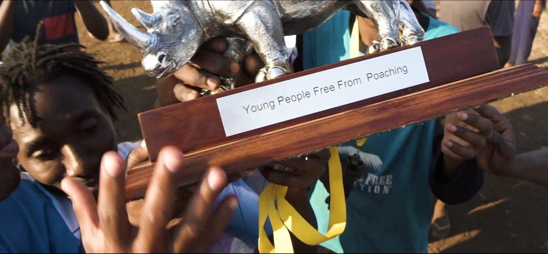Young People Free From Poaching, engraved on the Rhino Cup Trophy. Shot taken in September 2018, during the conclusion of the Rhino Cup Champions League.