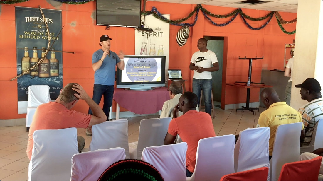 Matt Bracken speaks during a discussion on the expansion of the soccer project in Mozambique. Image from the Wild and Free Community meeting, April 2017.