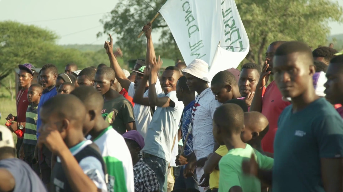 Agri-Sul Football Club soccer supporters celebrate a goal. An image from the opening day of the Rhino Cup Champions League in April 2018.
