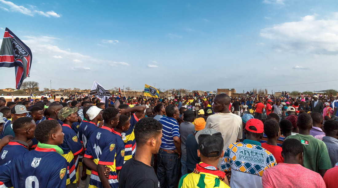 A magical moment for the 2019 Rhino Cup Champions League as the 24 soccer teams, the fans, and families gather at the prize giving ceremony to celebrate a season of success. More than 1,600 people from the 9 different communities joined together for this beautiful photo moment.